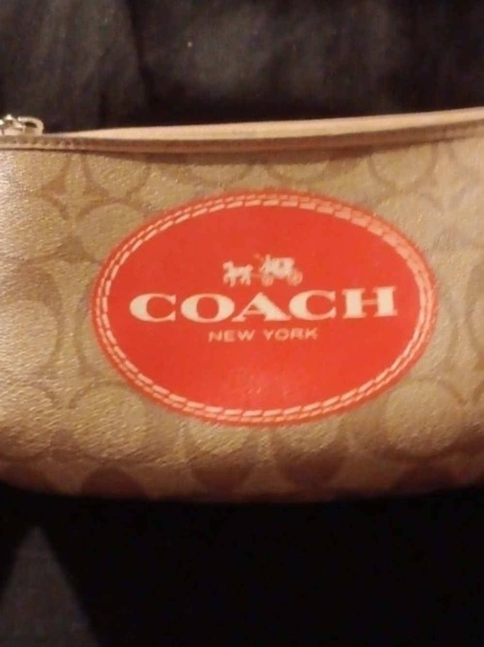 Coach Large Wristlet in Tan with Red Logo Patch